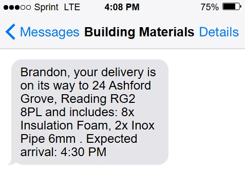 Customer SMS preview for a building materials delivery with itemised contents and ETA