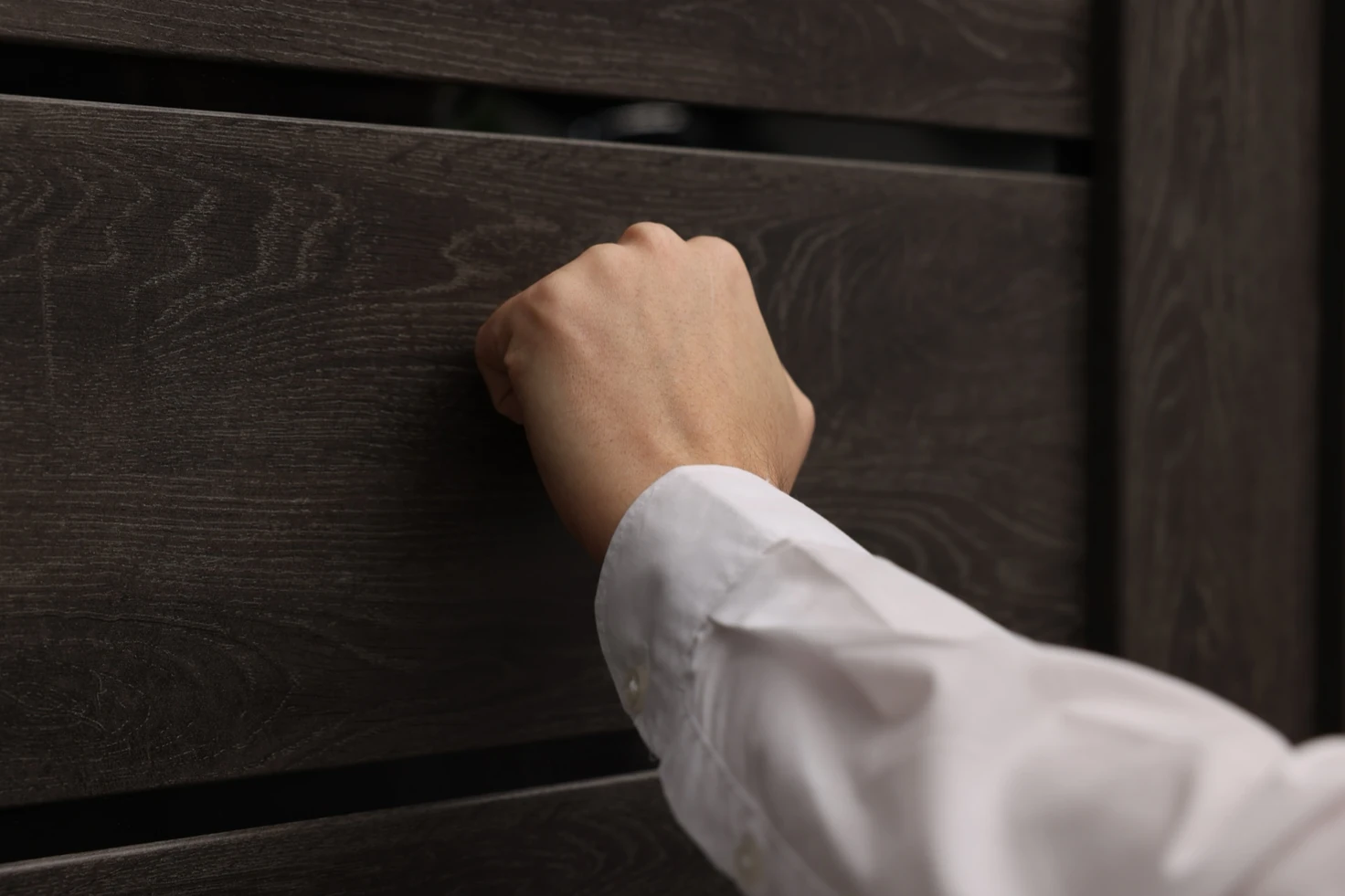 Field collections agent at a residential doorstep visit