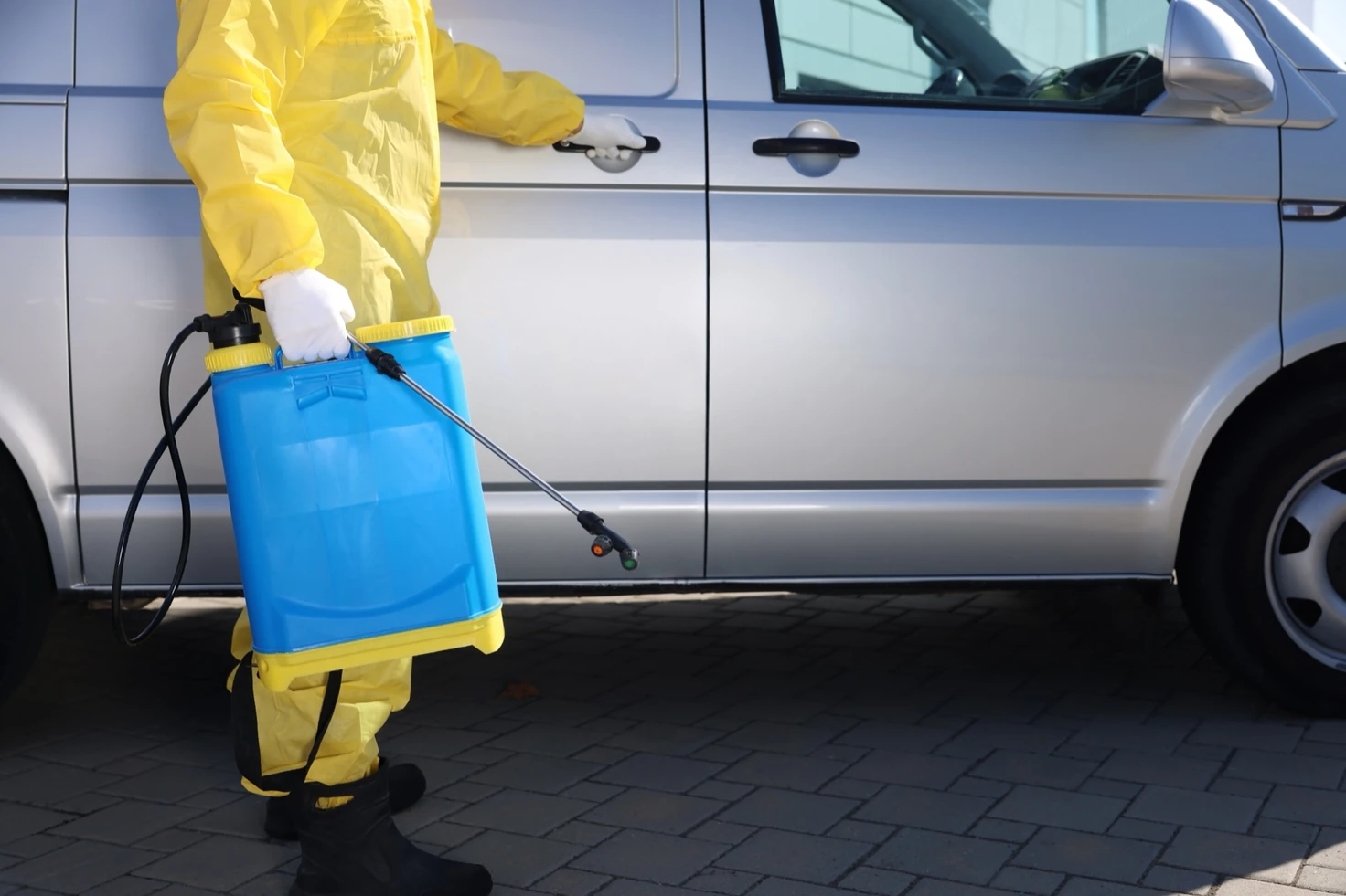 Pest control technician treating a commercial property