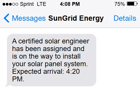 Customer SMS preview confirming a solar engineer visit ETA