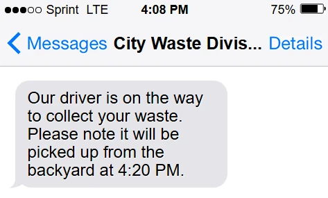 Customer SMS preview confirming a waste collection ETA