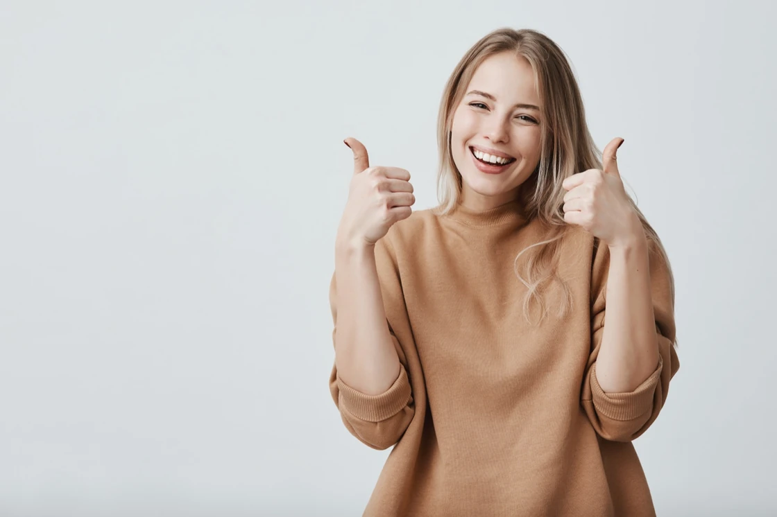 A happy customer giving a thumbs up after a smooth delivery