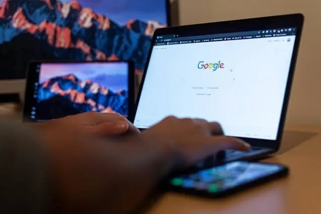 close_up_shot_of_a_person_using_a_laptop