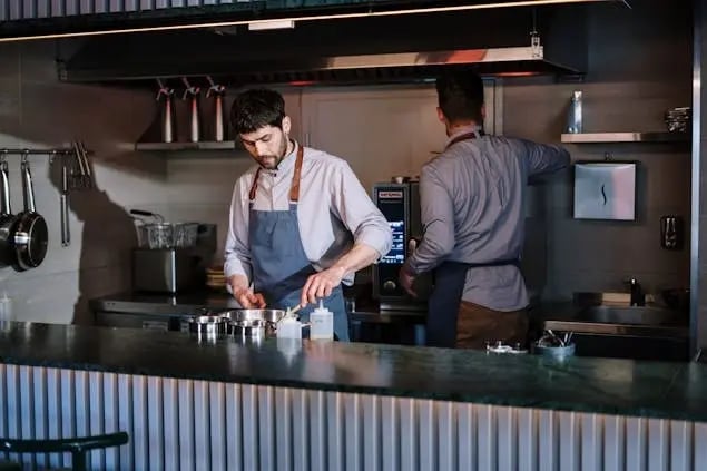 cook-preparing-food-in-a-restaurant-kitchen