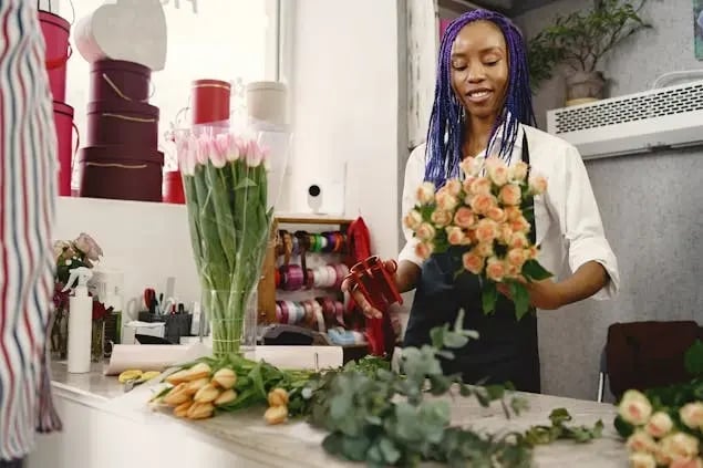 a-florist-arranging-a-bouquet